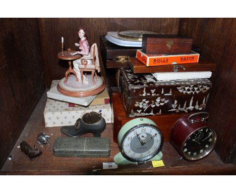 SECTION 40. A set of graduated Oriental mother of pearl boxes, a rosewood writing box, two alarm clocks, a wall clock, and ot