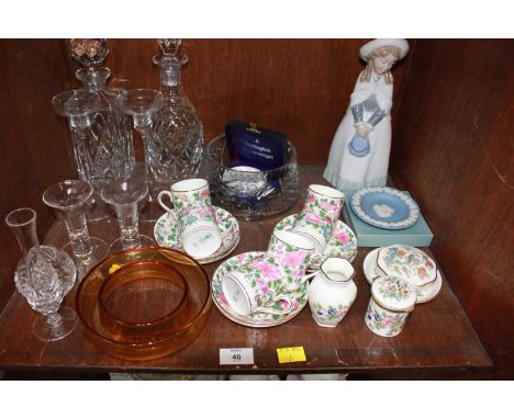 SECTION 46. A collection of assorted ceramics and glass including a Nao figure, Dartington candlesticks, Crown Staffordshire 