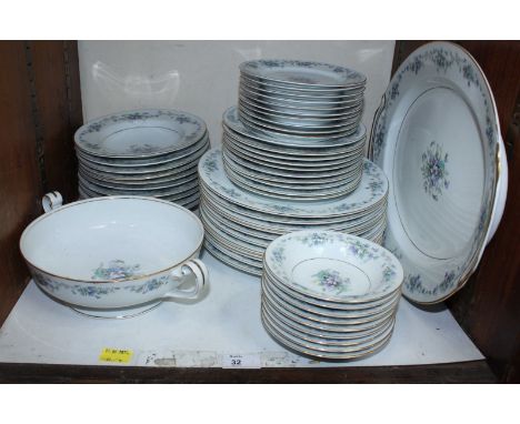 SECTION 32. A Noritake Violette porcelain dinner service.