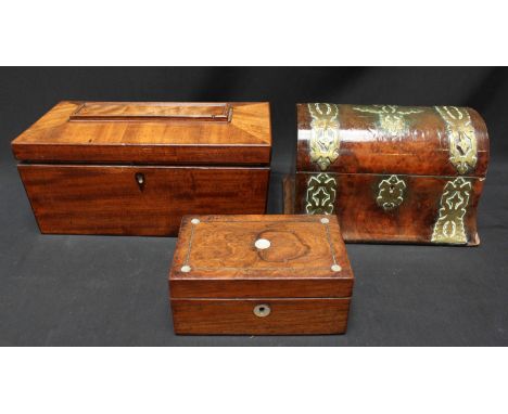 A Victorian walnut brass mounted domed top stationery box, together with a larger mahogany tea caddy and a smaller rosewood j