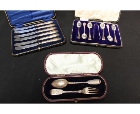 A cased set of six silver teaspoons and sugar tongs, together with a set of six silver handled knives and a cased fork and sp