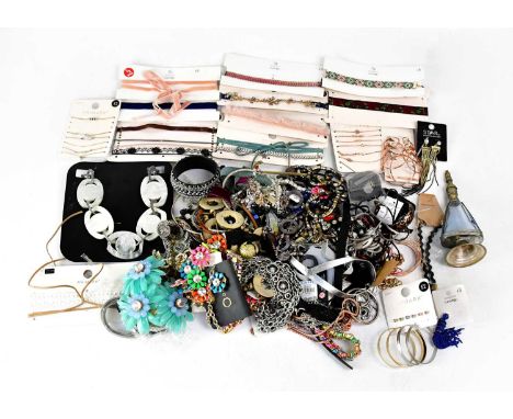 A quantity of modern, mainly metallic costume jewellery, to include a hallmarked silver bangle, statement necklaces, chokers,