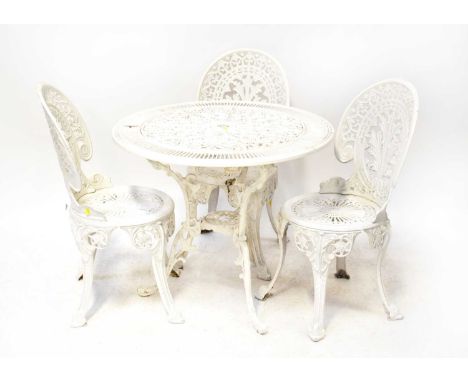 A modern cast aluminium circular garden table, diameter 80cm, height 70cm, together with three matching chairs, also a cast a