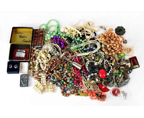 A quantity of mainly vintage costume jewellery, to include brooches, rings, necklaces, beaded necklaces, bracelets, scarf cli