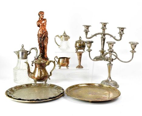 A small quantity of silver plated items including two three-branch candelabra, a mallet-shaped claret jug, three salvers, cof