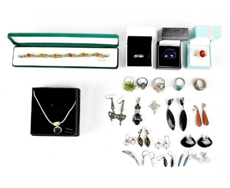 A quantity of 925 silver jewellery set with stones, to include a pendant set with a blue glass cabochon, on a snake chain nec