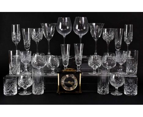 A quantity of clear glass drinking glasses, wine glasses, a decanter, vase, etc, two green and yellow tulip-shaped vases (af)