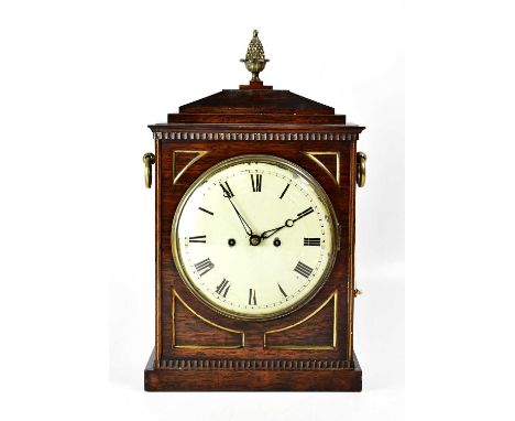 A Regency rosewood and gilt brass twin fusee repeating bracket clock with architectural top surmounted with pineapple finial,