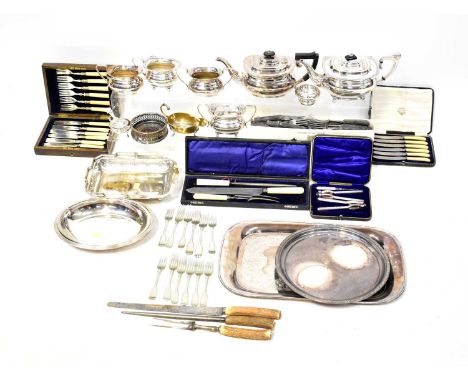 A quantity of silver-plated items including a four-piece part tea set, wine coasters, sauceboat, cased sets of cutlery includ