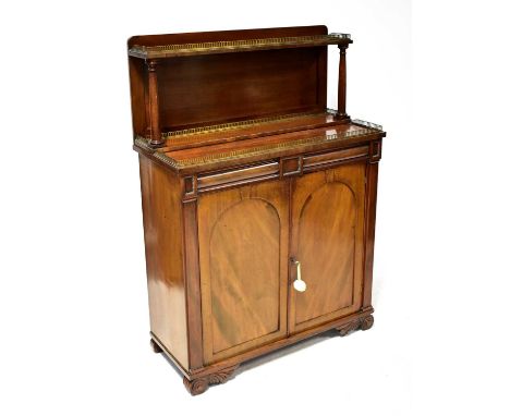 A 19th century mahogany side cabinet, the single shelf back with brass gallery front and sides, raised on tapered columns, wi
