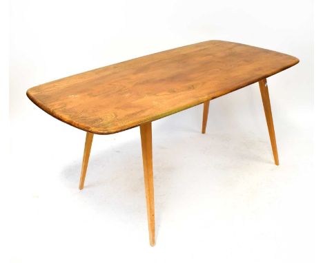 ERCOL; a blonde elm rounded rectangular dining table on outswept tapering supports, for restoration, 71 x 152 x 76cm.