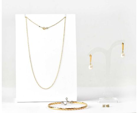 A 9ct yellow and white gold bangle, together with a pair of 9ct yellow gold stud earrings set with white stones and a 9ct yel