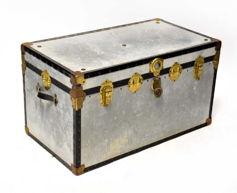 An alloy travel trunk with studded decoration and brass-effect furniture, 51 x 92 x 51cm.Condition Report: Lacking key, other