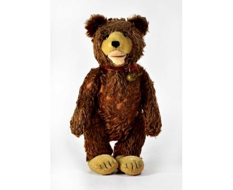 STEIFF; a jointed mohair teddy bear, with button to ear, and growler, height approx. 42cm (af).Condition Report: - Mohair wor