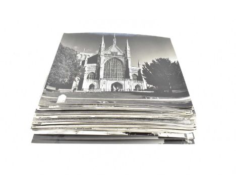 A collection of c.1970s large black and white photographs of exteriors of stately homes, country houses, churches and cathedr