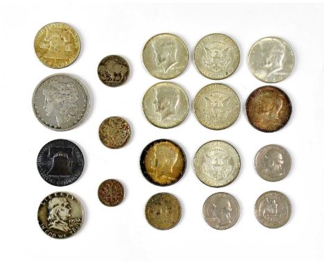 A collection of United States coinage to include a 1890 Morgan dollar, various part-silver coins, buffalo dimes, etc.Conditio