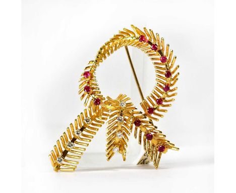 An 18ct yellow gold feathered knotwork brooch set with rubies and diamonds, stamped '18', London 1965, R&amp;D, 3.8 x 5.8cm, 