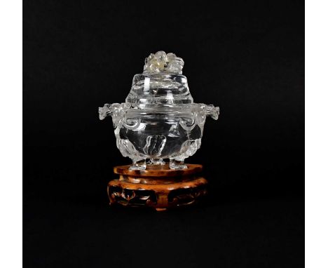 A 19th century Chinese rock crystal censer and cover, the cover carved with Dogs of Fo and the body carved with two dragons' 