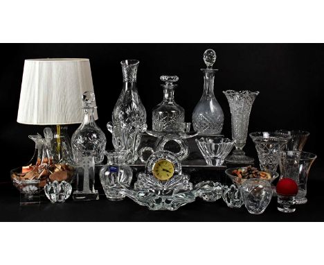 A quantity of cut and moulded glassware including vases, a lamp, decanters, candlesticks, bowls, etc (2).Condition Report: - 