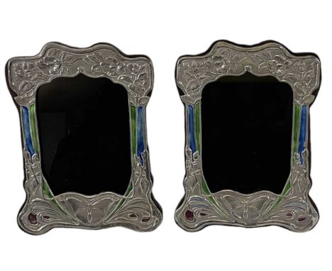 A pair of sterling silver Art Nouveau style blue, green and purple enamelled easel back photograph frames, decorated with but