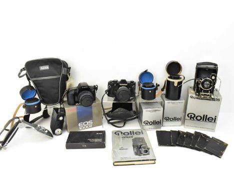 A quantity of vintage cameras and accessories, lenses, flash gun etc, to include a Rolleiflex SL35 camera, a Rollei Distagon 