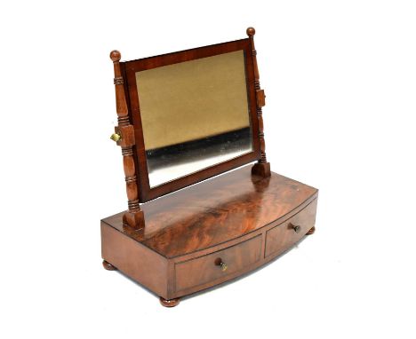 An oak occasional table with octagonal top, raised on three faux bamboo columns, on tripod supports, height 70cm, diameter of