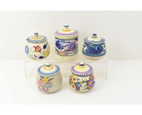 POOLE POTTERY; five floral preserve or honey pots, the largest with bluebird pattern, height 13cm, the other example decorate