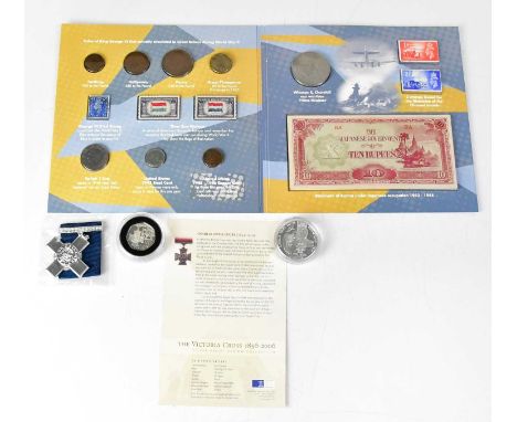 A 'World War II Remembered' pack, a silver proof crown commemorating Charles Davis Lucas, an encapsulated Victoria Cross 50p 