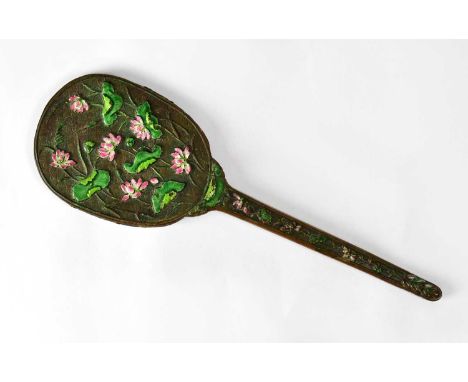 A Chinese hand mirror decorated with lotus leaves and flowers, with ovoid bevelled plate, overall length 35cm.
 Provenance: T