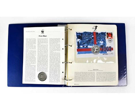 A collection of UK first day coin covers, comprising two 2002 World Cup with one crown coins, three 2002 World Cup with £1 co
