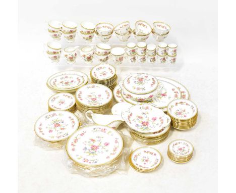 COALPORT; a one hundred and twenty-six piece 'Persian Flower' pattern tea and dinner set comprising bowls, dinner plates, sou