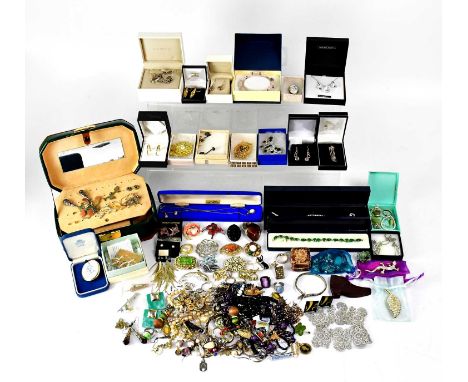 A large quantity of costume jewellery to include a Swarovski heart-shaped pendant and a pair of earrings, a cubic zirconium t
