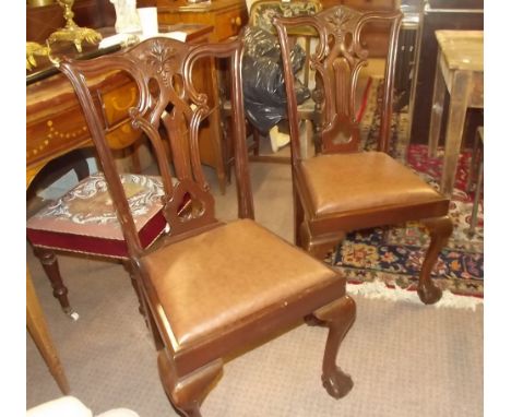 Set of six + two late Edwardian mahogany dining room chairs in the Chippendale style. 