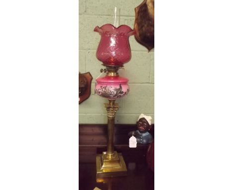 Victorian oil lamp with brass Corinthian column pink ceramic bowl and tulip shade. 