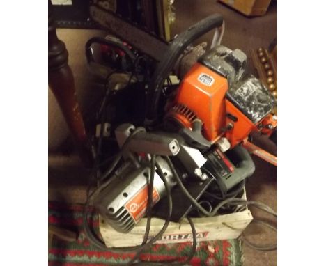 Collection of tools and trimmers Homelite and Oregon chain saw. 