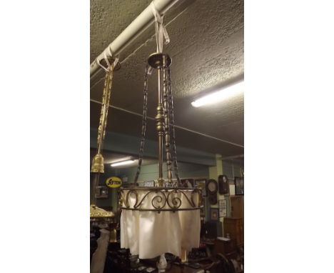 1920's brass electric hanging lamp with original cloth shade. 