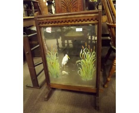 Edwardian oak fire screen inset with mirror in the Gothic style. 