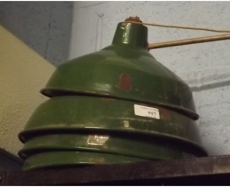 Four retro industrial enamel lamp shades. 