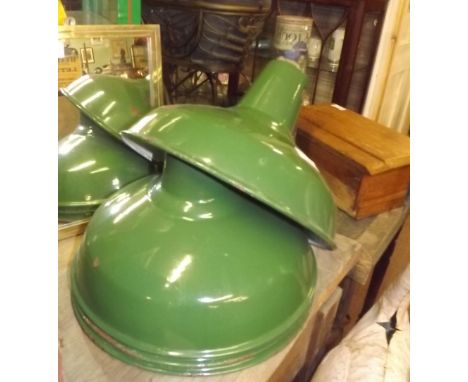 Four retro industrial enamel lamp shades. 