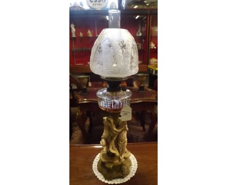 Victorian oil lamp with ceramic base in the form of children cut glass bowl and beehive glass shade.  