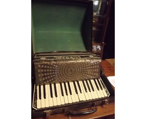 SOPRANI piano accordion in box. 