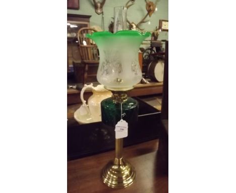 Oil lamp with brass base green bowl and etched tulip shade. 