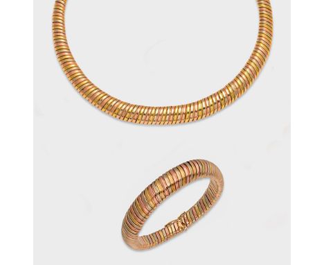 Collier mit korrespondierendem Armband. Tricolor-Gold, gest. 14 ct.; Ges.-Gew. ca. 60 g.Necklace and bracelet, in 14 k tricol