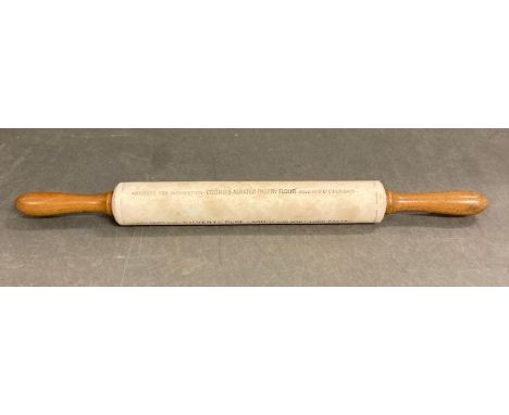 A Farrar Whitefield "Isobel" rolling pin with advertising 