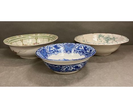 Three large ceramic bowls