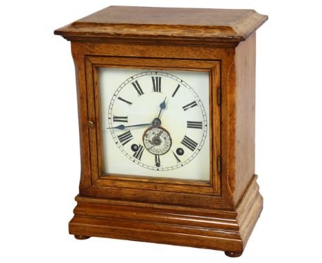 A Victorian oak-cased 8-day office mantel clock, with alarm movement, case height 26cm 