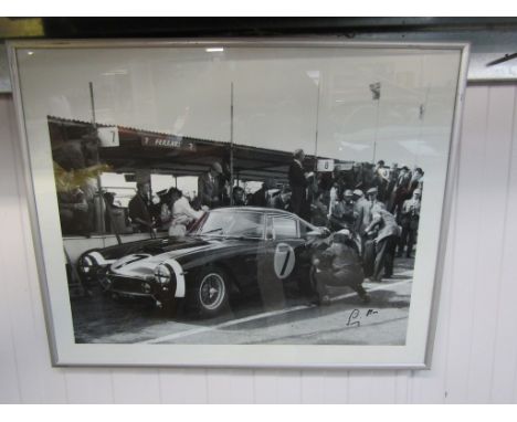 A framed photo print of a Ferrari 250 GT bearing signature 'Sterling Moss'