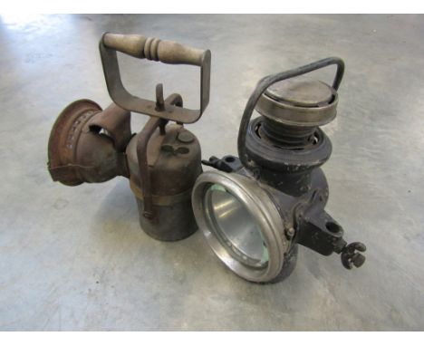 A premier lamp reg No. 686127 and a Joseph Lucas lamp