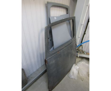 Four vintage car doors including Austin 7 and an Austin 7 boot lid 