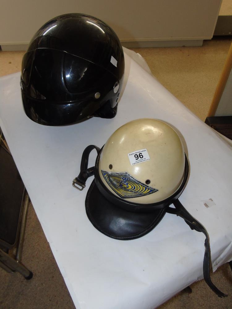2 VINTAGE CRASH HELMETS